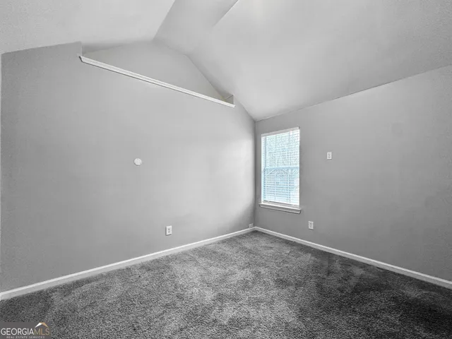 a view of an empty room with window