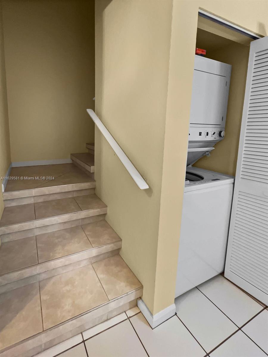 369 Waterside Drive, Unit 369 Hypoluxo, FL 33462 - Photo 8 of 23 a view of an entryway with staircase