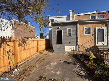 a front view of a house with parking