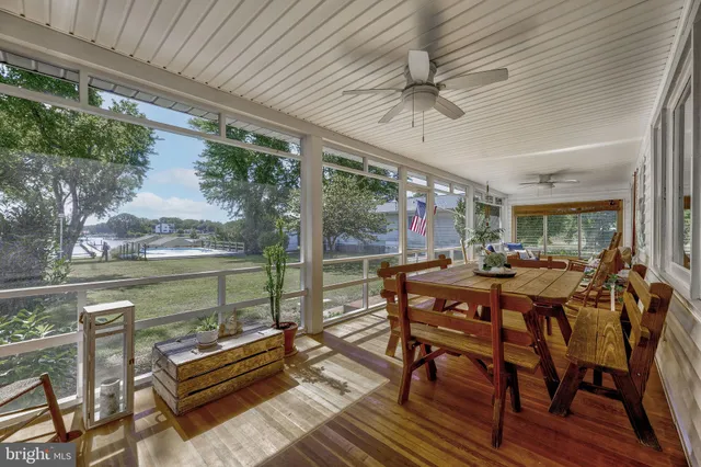 a outdoor space with lots of tables and chairs