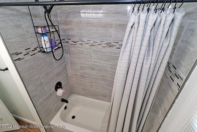 329 Briggs Avenue Forked River, NJ 08731 - Photo 11 of 15 a bathroom with a bathtub