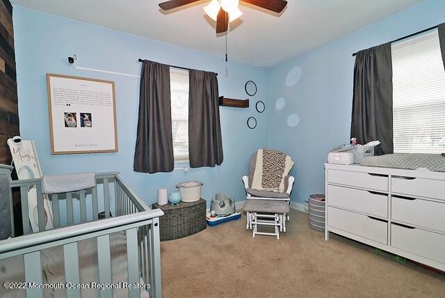 329 Briggs Avenue Forked River, NJ 08731 - Photo 13 of 15 a bedroom with furniture and a window