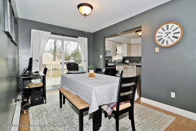 329 Briggs Avenue Forked River, NJ 08731 - Photo 4 of 15 a dining room with a table and chairs
