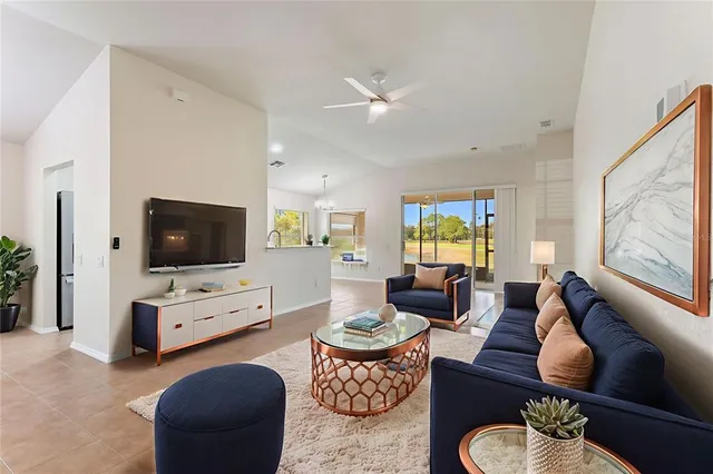 a view of a house with sitting area and furniture