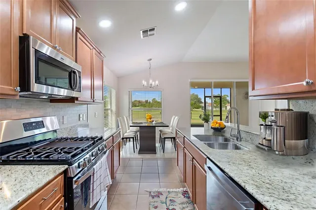 an aerial view of a house with outdoor space