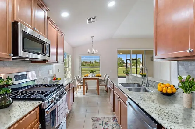 a view of a swimming pool with a outdoor seating