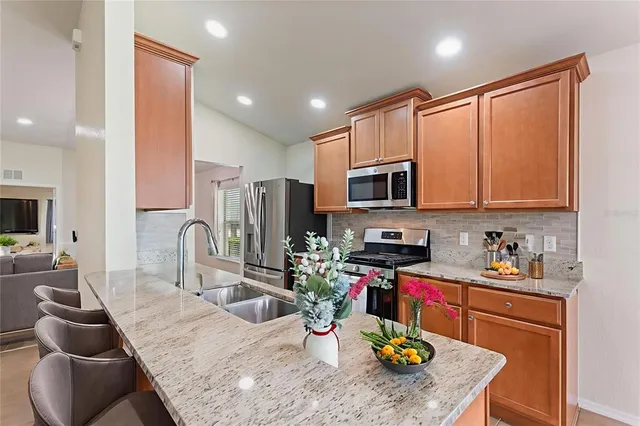 a room with pool table table and chairs
