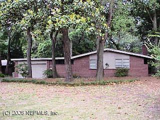 2732 Red Fox Road Orange Park, FL 32073 - Photo 1 of 1 a backyard of a house with lots of green space