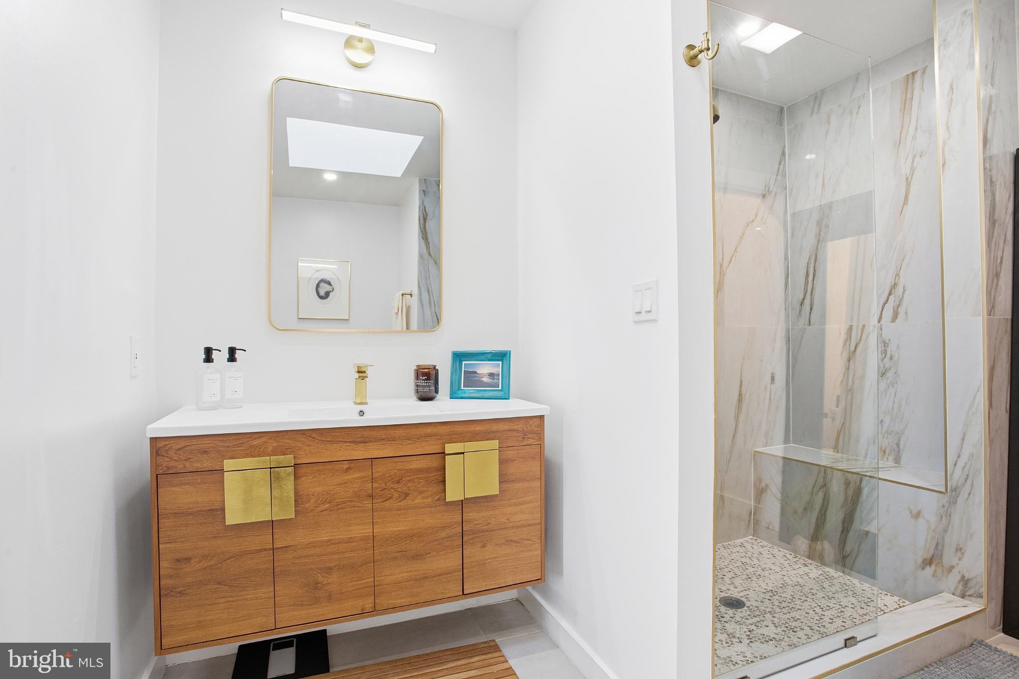 4903 9th Street Northwest Washington, DC 20011 - Photo 19 of 28 Sleek modern bathroom with elegant finishes.