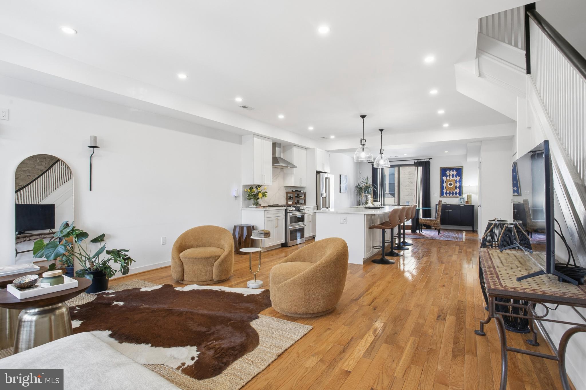 4903 9th Street Northwest Washington, DC 20011 - Photo 3 of 28 Spacious modern living area with warm tones.