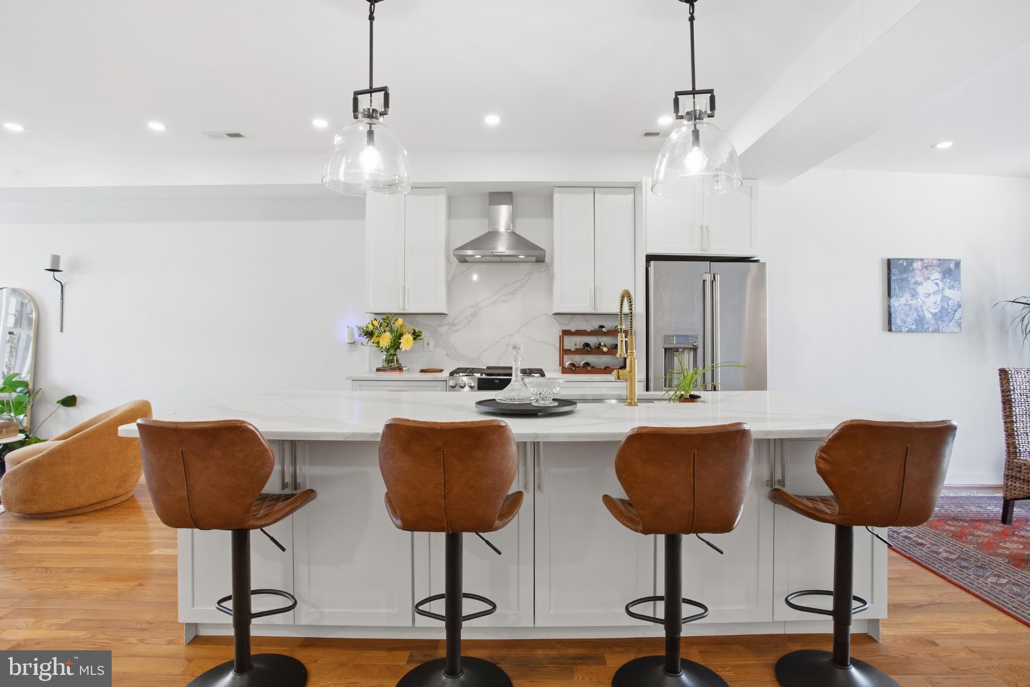 4903 9th Street Northwest Washington, DC 20011 - Photo 9 of 28 Modern kitchen with stylish seating.