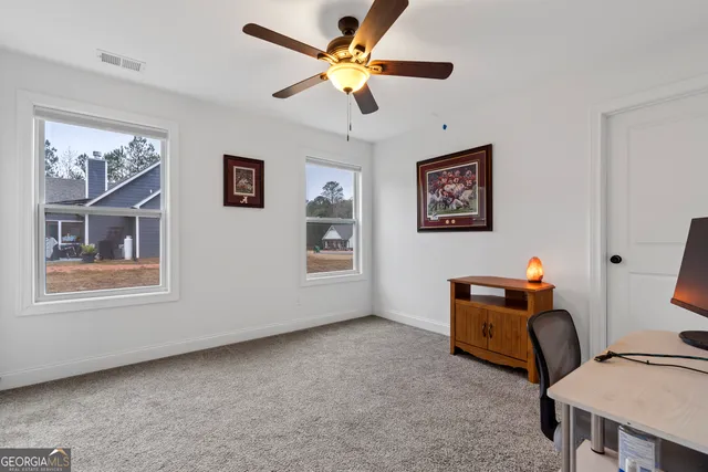 a room with furniture and window