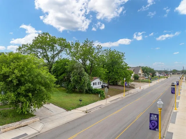 a view of a city street from a building