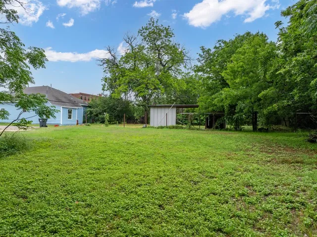 a house view with a garden space