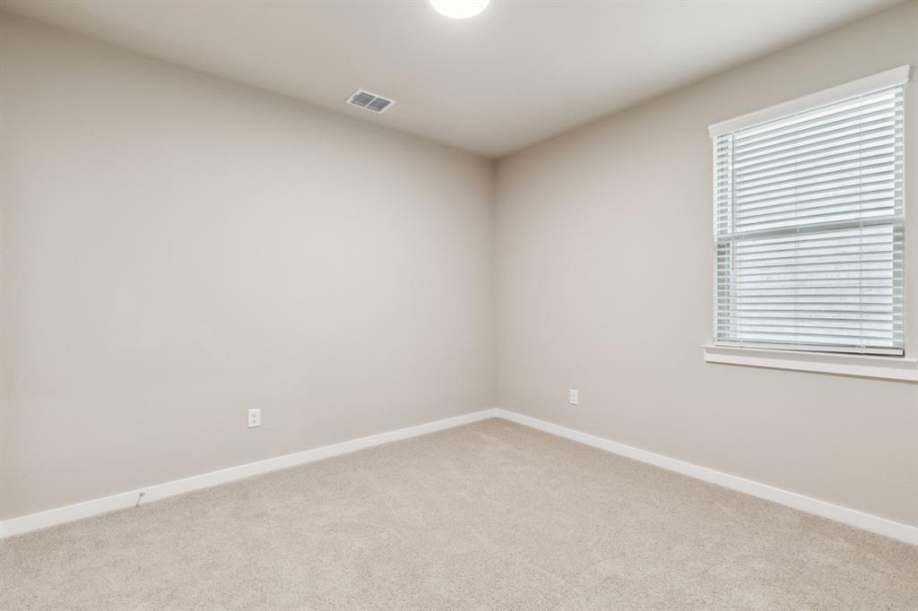 8308 Coastal Lane Pilot Point, TX 76258 - Photo 23 of 32 an empty room with a window