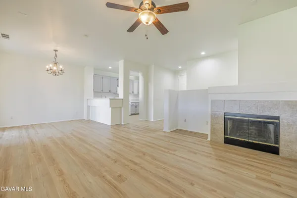 a view of a livingroom with a kitchen