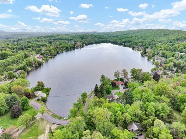 a view of a lake and a yard