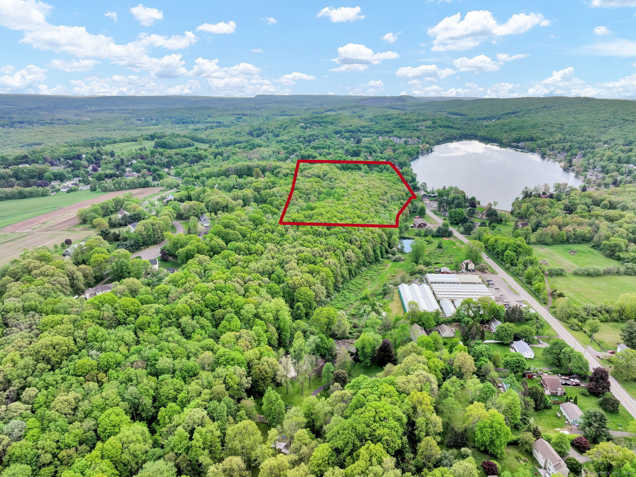 Baileyville Road Middlefield, CT 06455 - Photo 8 of 15 an aerial view of a house with a yard and outdoor seating