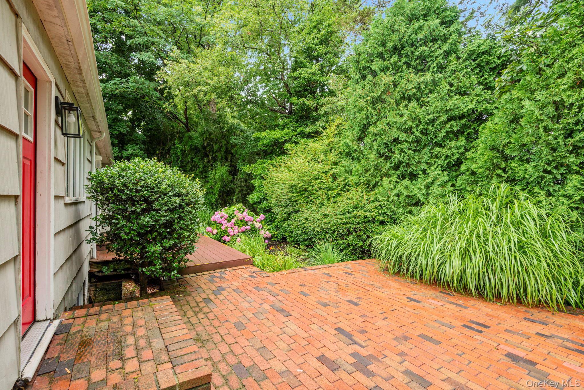 75 Cove Road Huntington, NY 11743 - Photo 33 of 38 Great patio spot off the kitchen