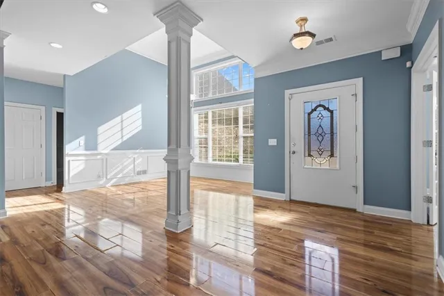 a view of livingroom with hardwood floor and hallway