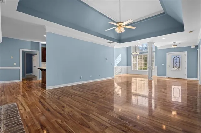 a view of a livingroom with wooden floor