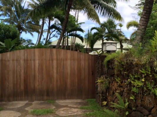 7224 Alamoo Road, Unit 2 Hanalei, HI 96714 - Photo 2 of 4 a view of house with palm tree