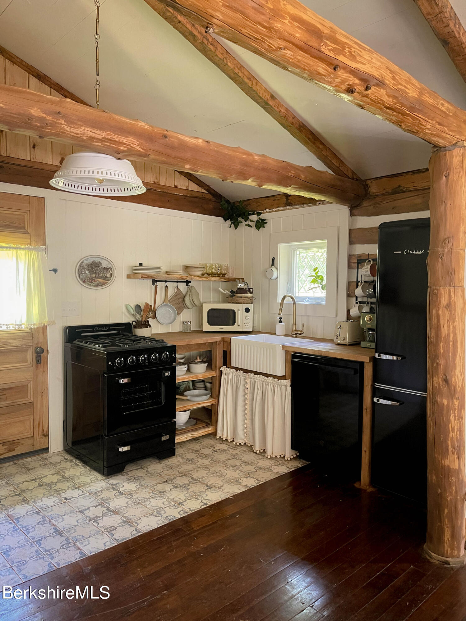 2399 Hancock Road Hancock, MA 01267 - Photo 13 of 23 a kitchen with a refrigerator and a stove