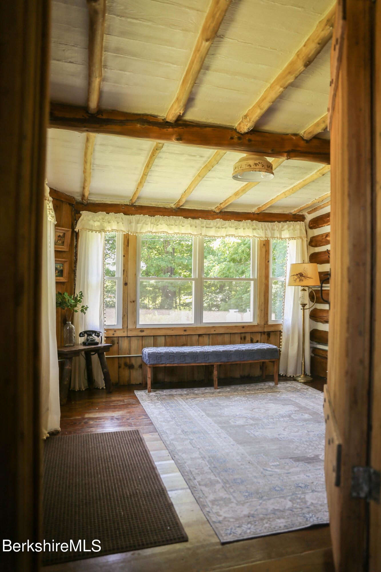 2399 Hancock Road Hancock, MA 01267 - Photo 6 of 23 a living room with furniture and a large window