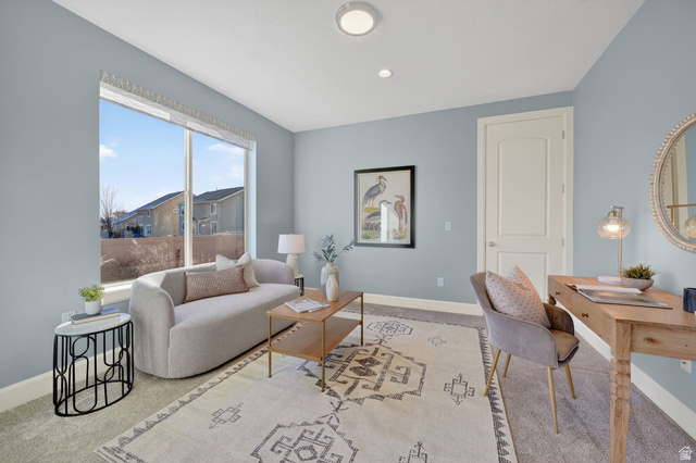 1222 West 190th Street North Mapleton, UT 84664 - Photo 19 of 46 Bright room featuring large windows, light blue walls, white trim, and a white interior door