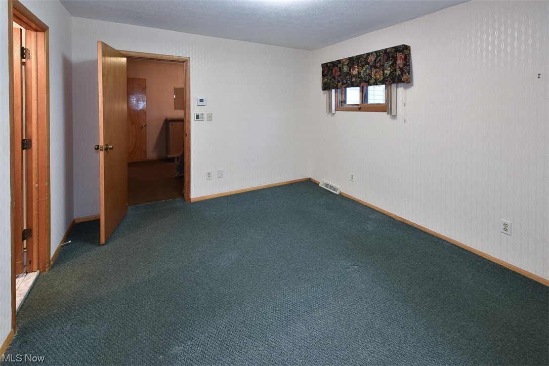 4026 Stonehaven Road Cleveland, OH 44121 - Photo 9 of 30 View of carpeted empty room
