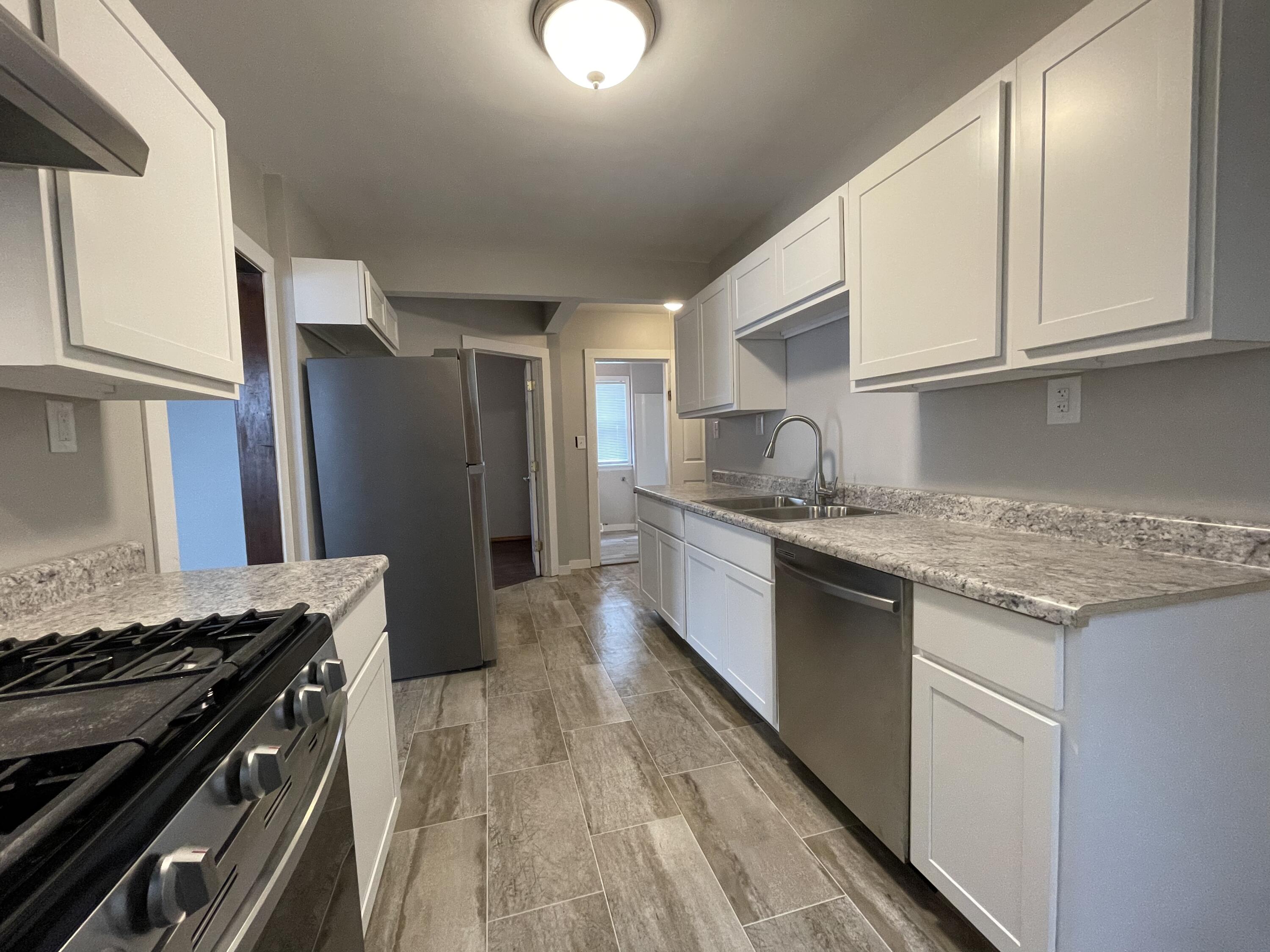 1405 Rathbone Street Southwest Wyoming, MI 49509 - Photo 7 of 31 FE6AB10C-FB36-4132-BABA-C79CD188CC89