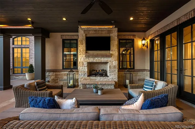 a view of a house with a yard and sitting area