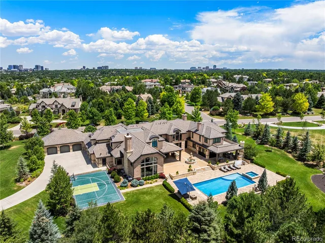 an aerial view of a house with a garden