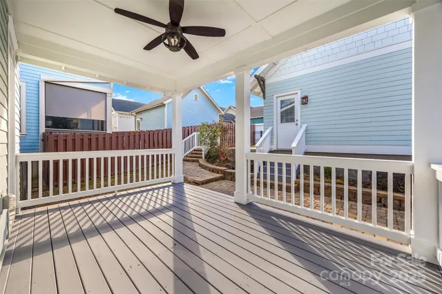a view of a balcony with wooden floor