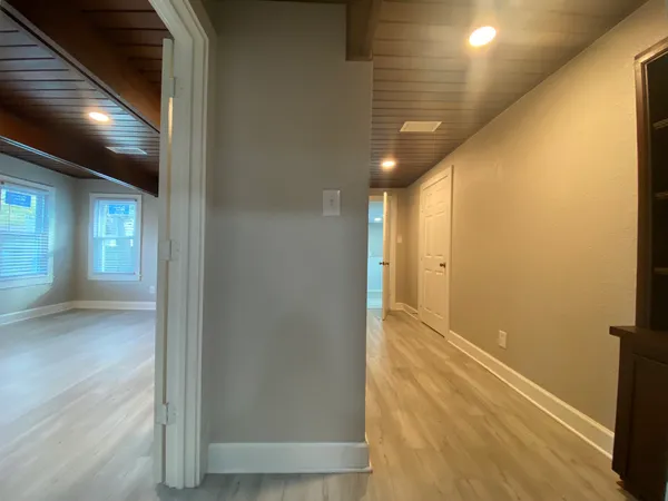 a view of hallway with livingroom