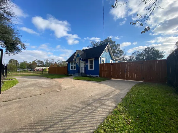 a view of backyard of a house