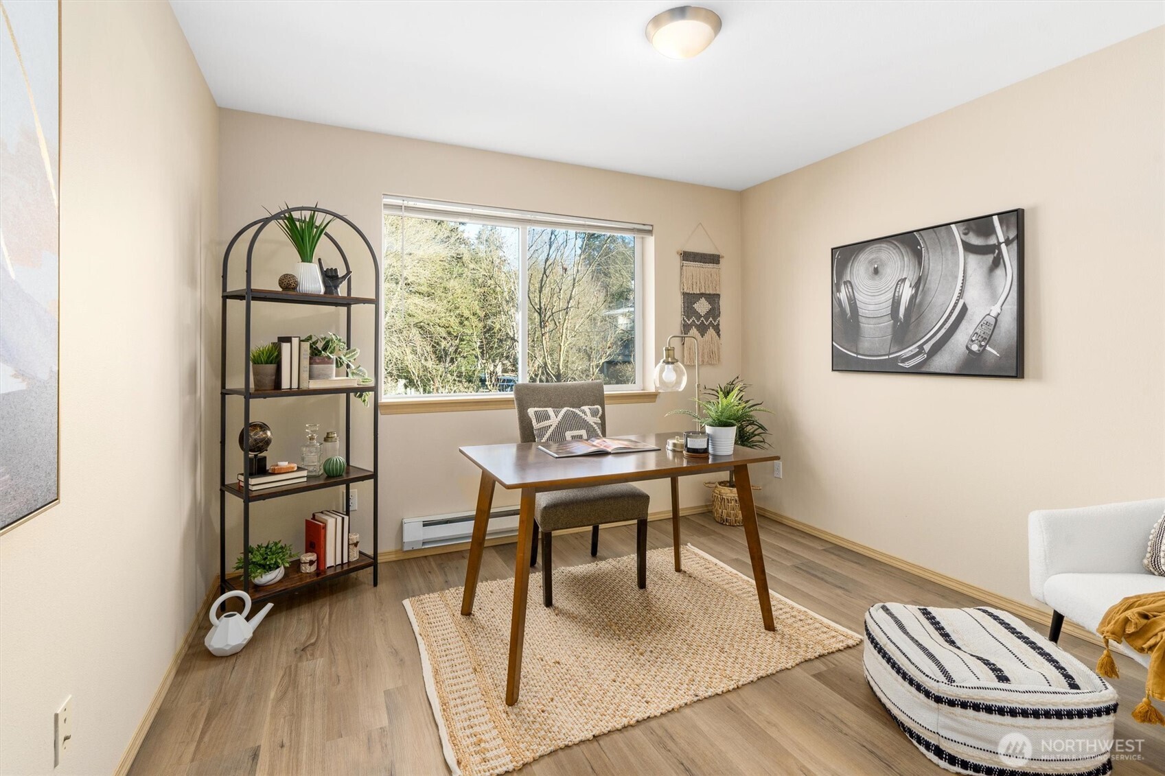 10709 Valley View Road, Unit A302 Bothell, WA 98011 - Photo 13 of 28 a view of a livingroom with furniture and a window