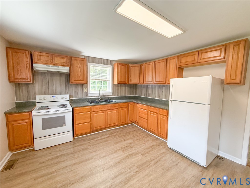 7798 West Courthouse Road Burkeville, VA 23922 - Photo 5 of 23 Kitchen featuring wood-finish flooring, natural wo