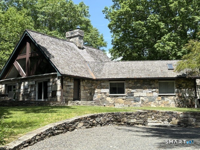40 Looking Glass Hill Road Litchfield, CT 06750 - Photo 2 of 33 a front view of a house with garden