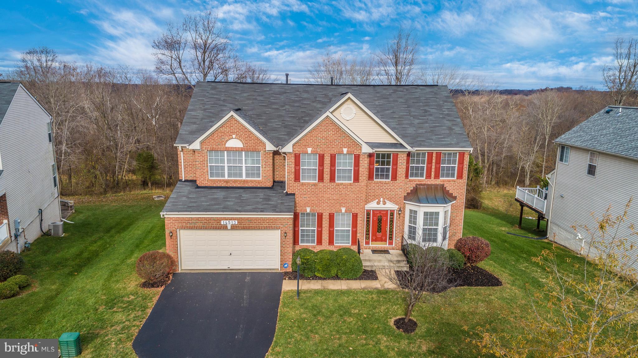 14513 Bubbling Spring Road Boyds, MD 20841 - Photo 1 of 57 front view of a house with a yard