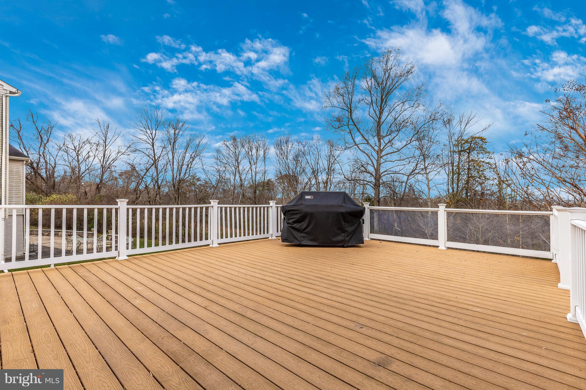 14513 Bubbling Spring Road Boyds, MD 20841 - Photo 19 of 57 a view of outdoor space with deck and tree