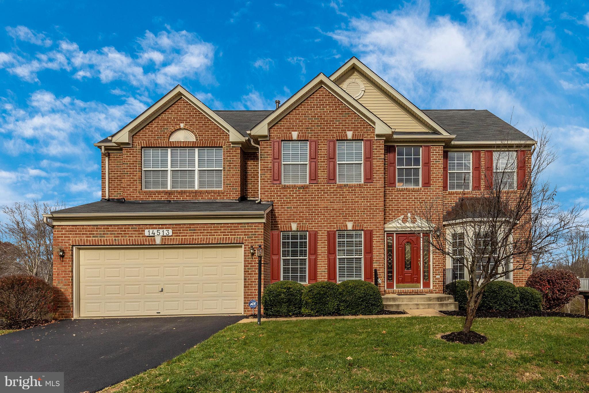 14513 Bubbling Spring Road Boyds, MD 20841 - Photo 42 of 57 a front view of a house with a yard