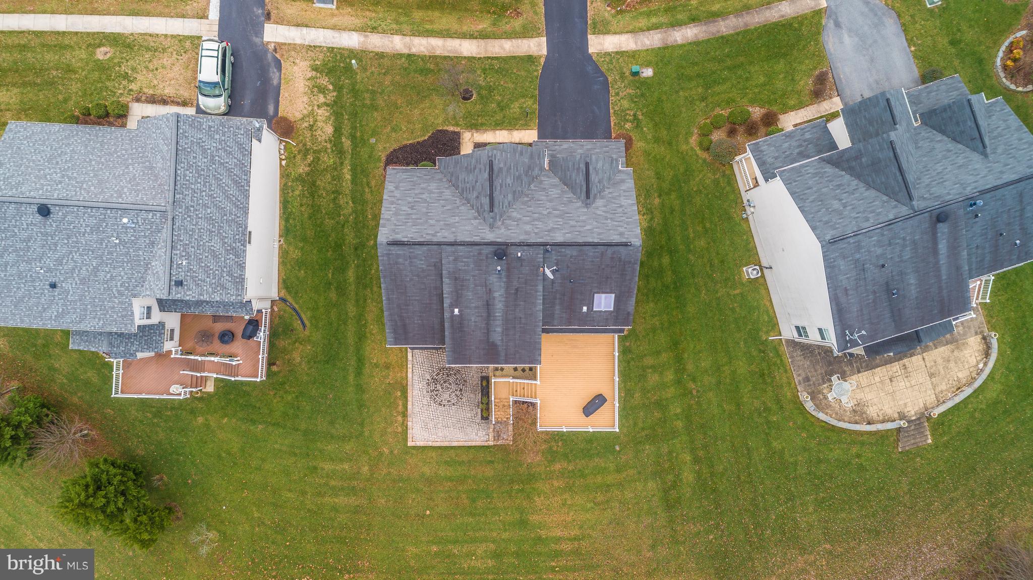 14513 Bubbling Spring Road Boyds, MD 20841 - Photo 51 of 57 an aerial view of a house with a garden and swimming pool