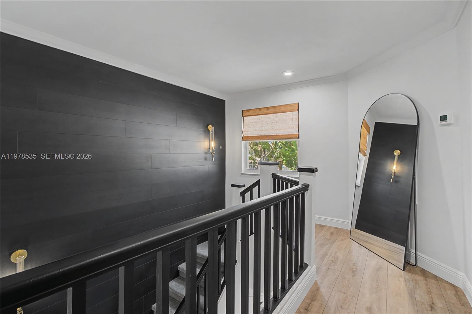 140 Eveningstar Cay Naples, FL 34114 - Photo 18 of 51 a view of a hallway view with staircase