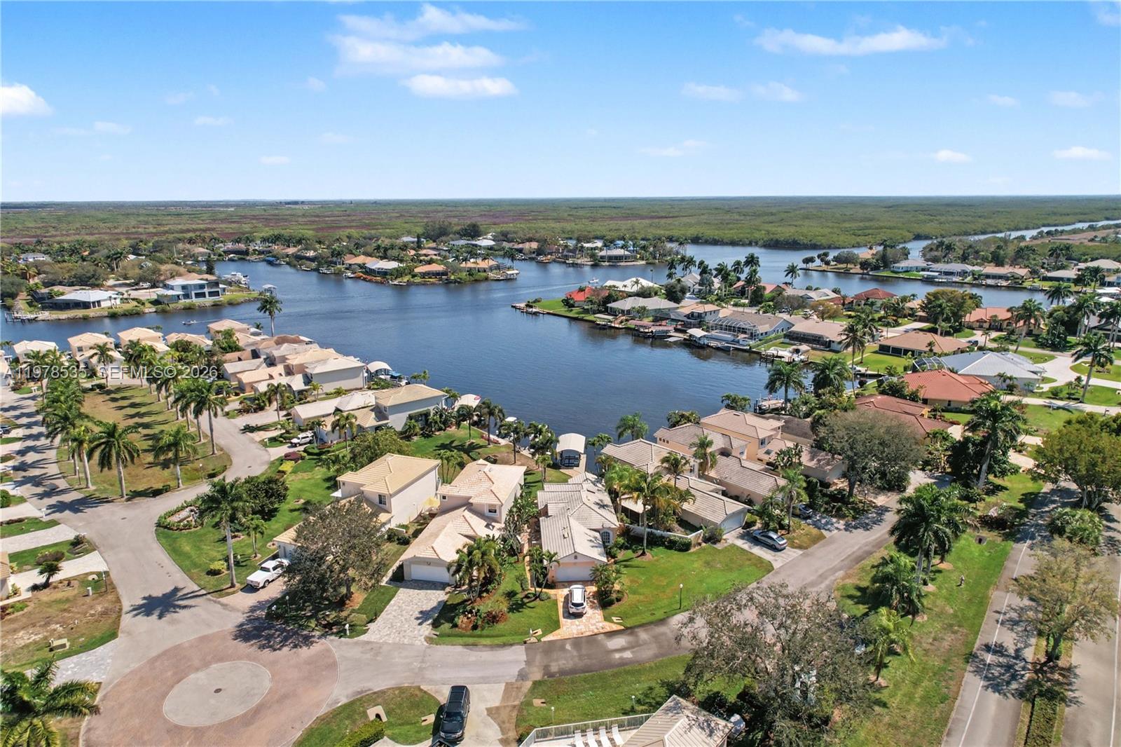 140 Eveningstar Cay Naples, FL 34114 - Photo 39 of 51 an aerial view of a city
