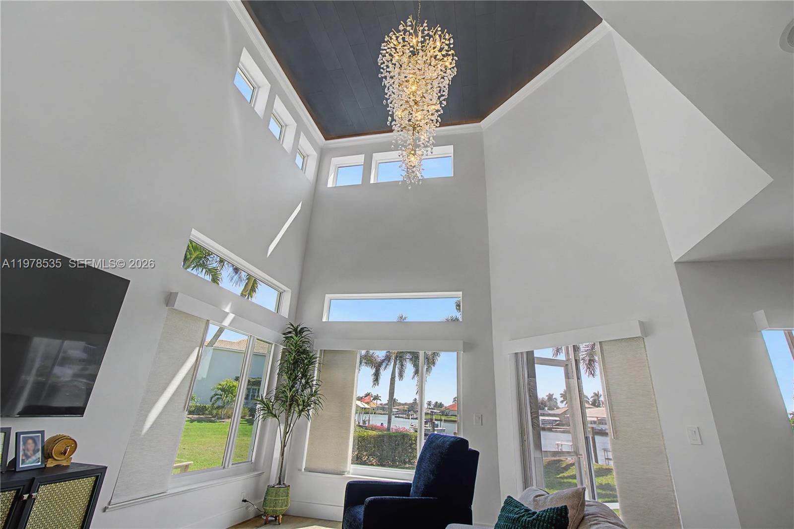 140 Eveningstar Cay Naples, FL 34114 - Photo 7 of 51 a view of an entryway with a livingroom