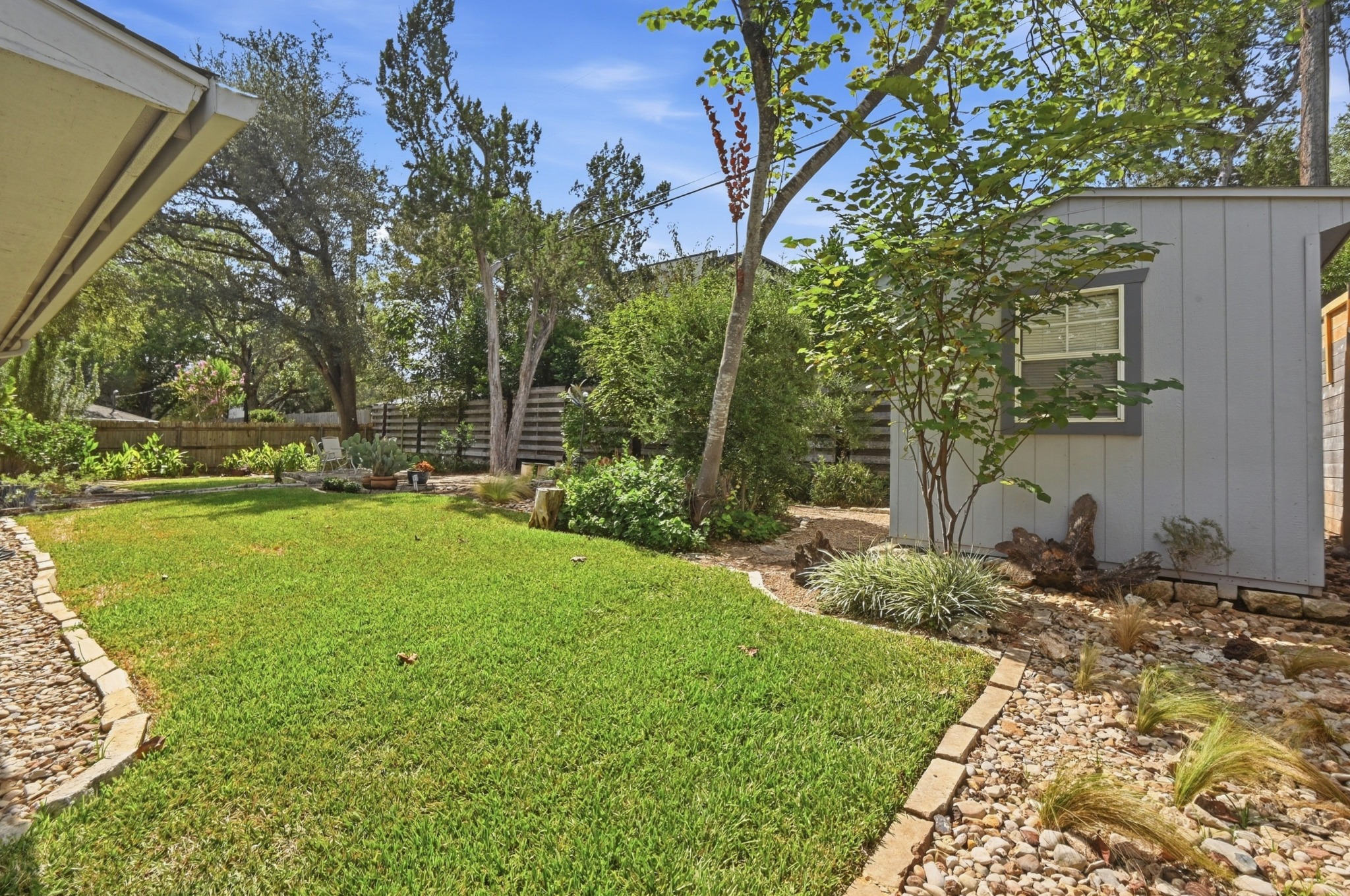 7313 Running Rope Austin, TX 78731 - Photo 24 of 26 The backyard includes a convenient shed