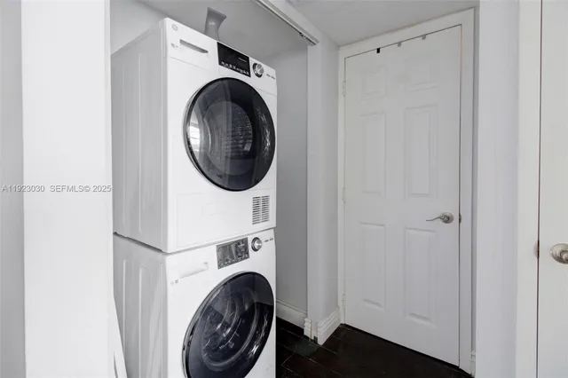 a view of bathroom with washer and dryer