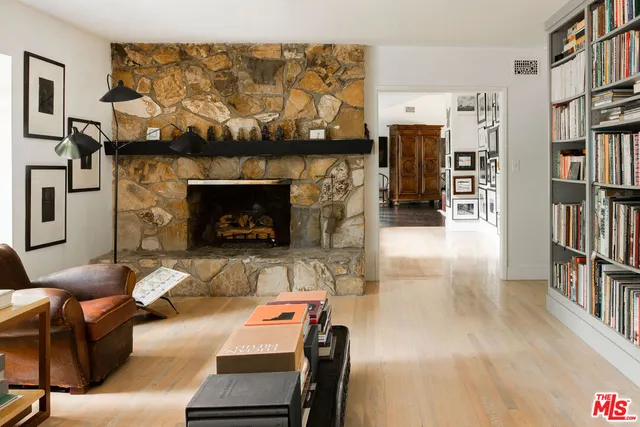 a bed room with a bed and a window