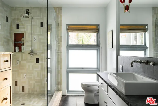 a living room with a couch and a large window